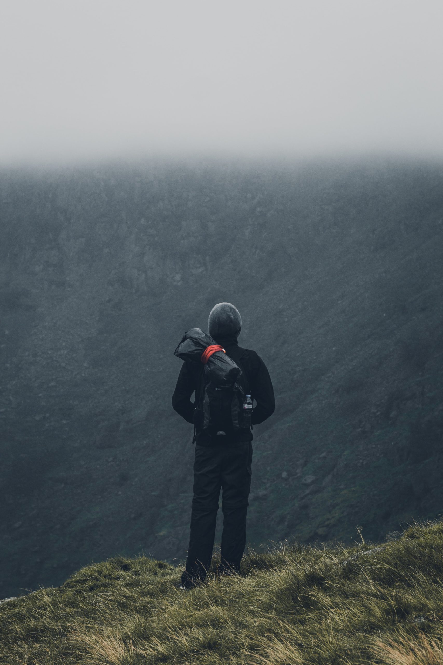 Person on top mountain looking into distance danny lines bdWgYnymN4U unsplash