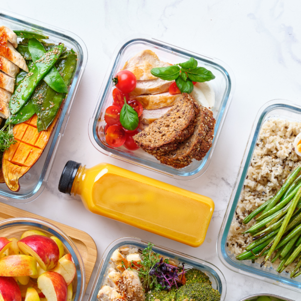 Nourish Your Mind meal prep food on white background