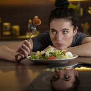 woman trying eat healthy home